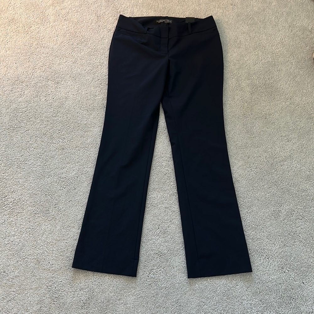 Navy blue, limited dress pants. Never worn. Size 8 regular